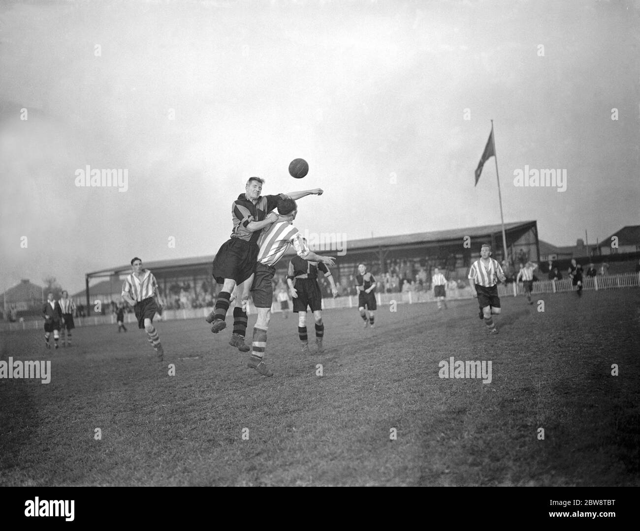 Dartford reserves vs. Sittingbourne - Kent League - 29/10/38 . Two players compete for the ball . 1936 Stock Photo