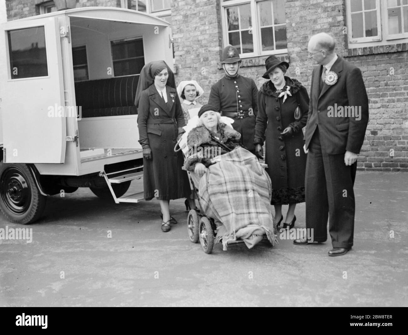 Election day : Mrs May , Countess of Limerick with the Conservative Party candidate for the Dartford by - election , Mr Geoffrey Mitchell and his wife , Mrs Mitchell . P C Sinclair PC 356 stands by . 1938 Stock Photo