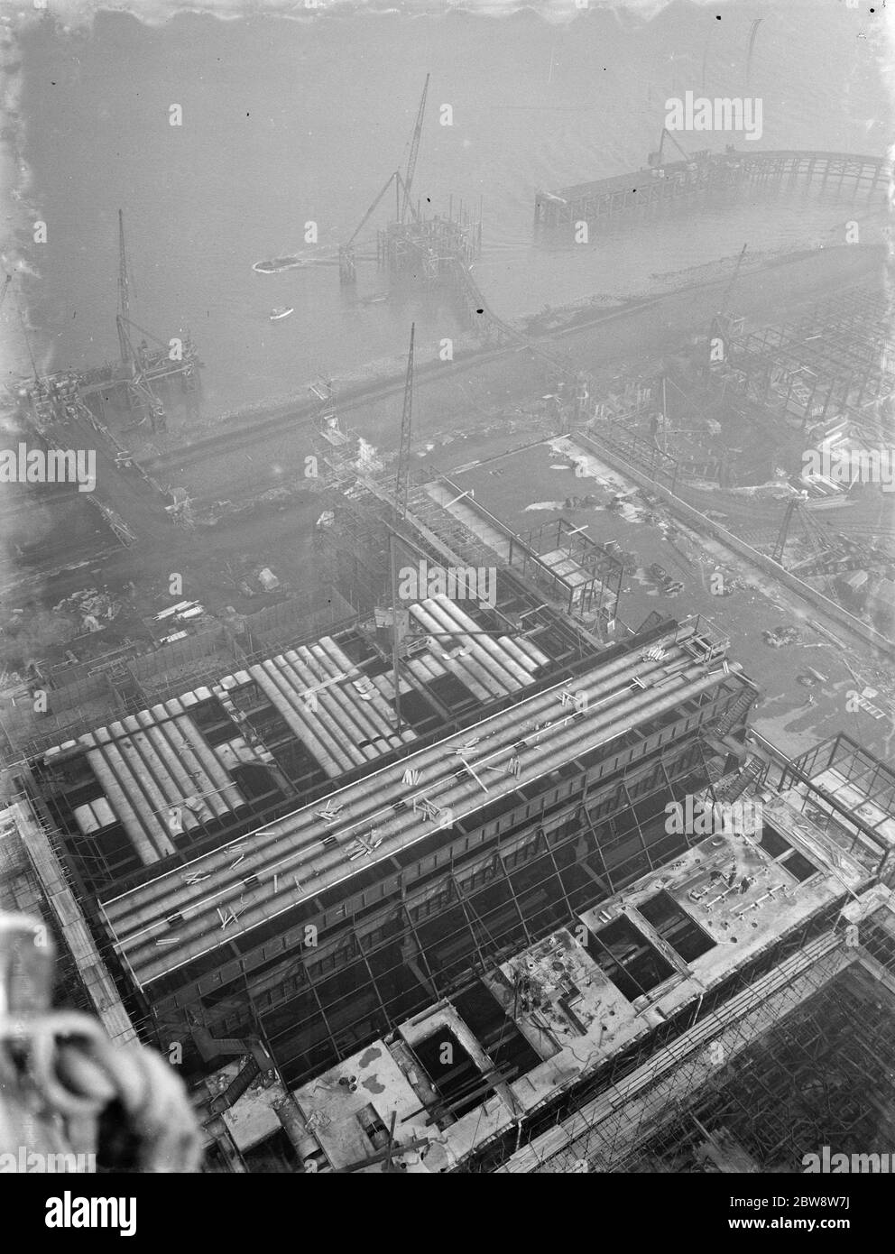 A general view from one of the chimneys of the new coal electric power station under construction near Dartford , Kent . 1938 Stock Photo