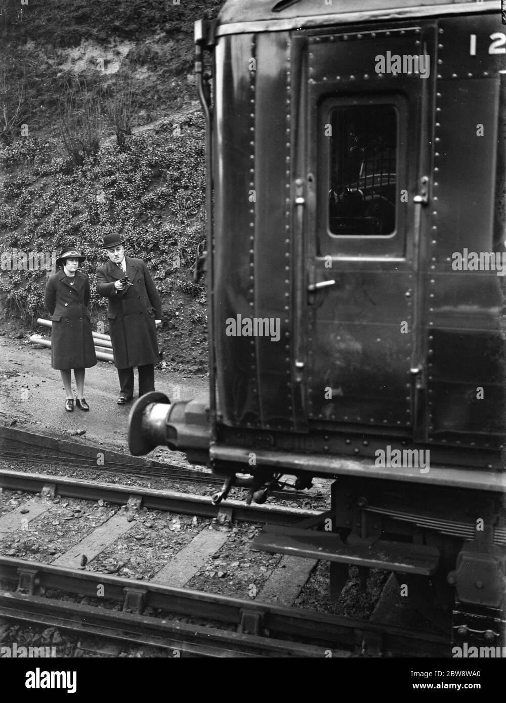 Testing electrified railway lines by steam train in Swanley , Kent . 1938 Stock Photo