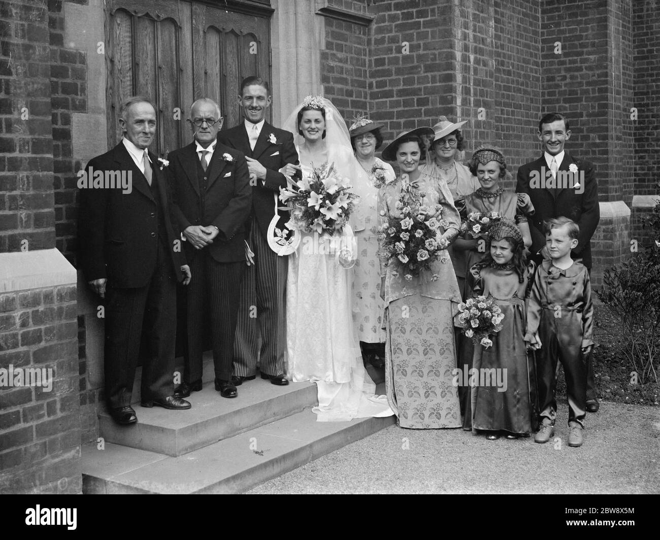 The wedding of O Budd and M Every . The wedding party . 1938 Stock Photo