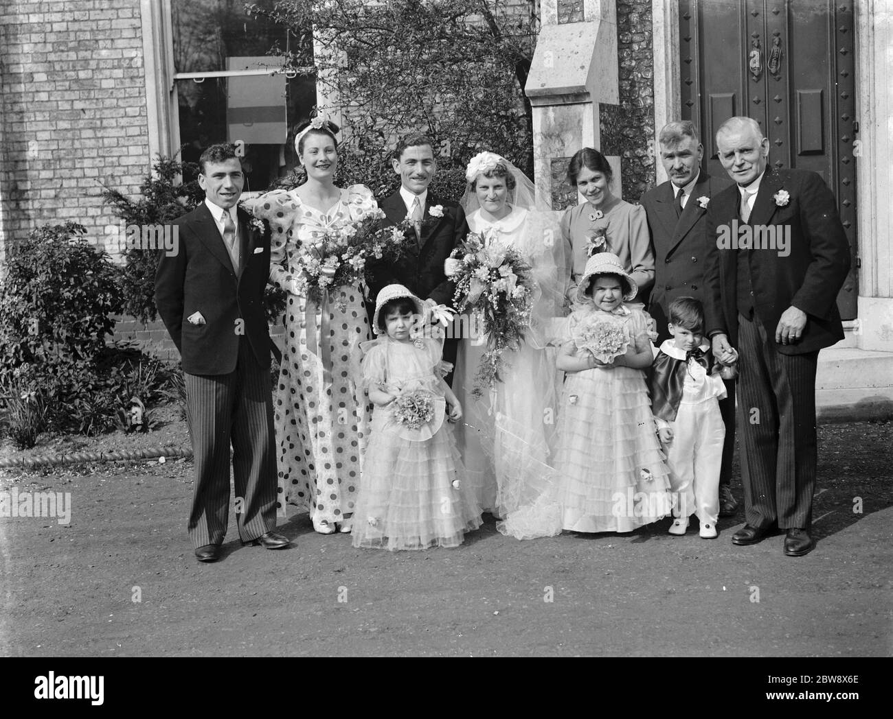 The wedding of Albert Dockerill and Miss Campbell . The wedding party . 1939 Stock Photo
