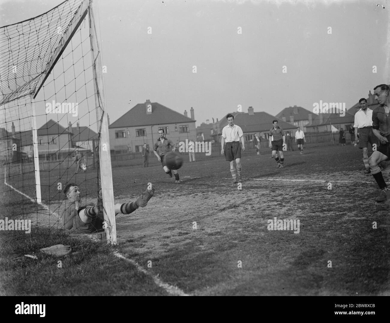 London football club versus Birmingham , methodist football . Goal mouth action . 1939 Stock Photo