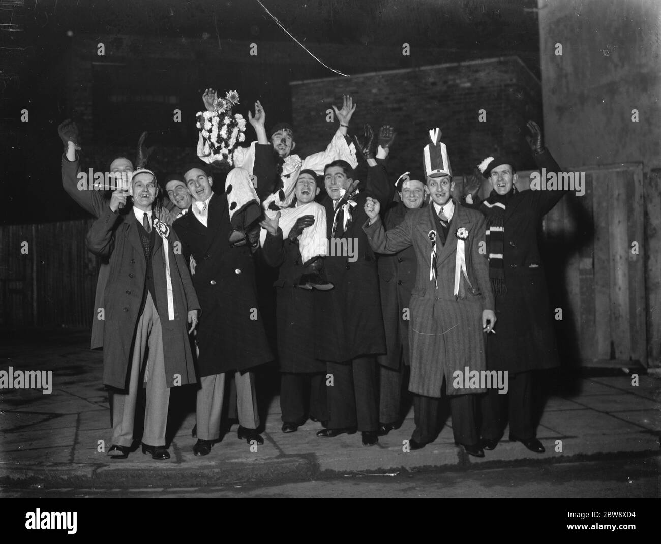 Dartford supporters - FA Cup - Dartford's supporters leave at midnight to travel to Shildon for their FA Cup tie - 12/12/36 Charabanc party ready to go and support Dartford football club . 1936 Stock Photo