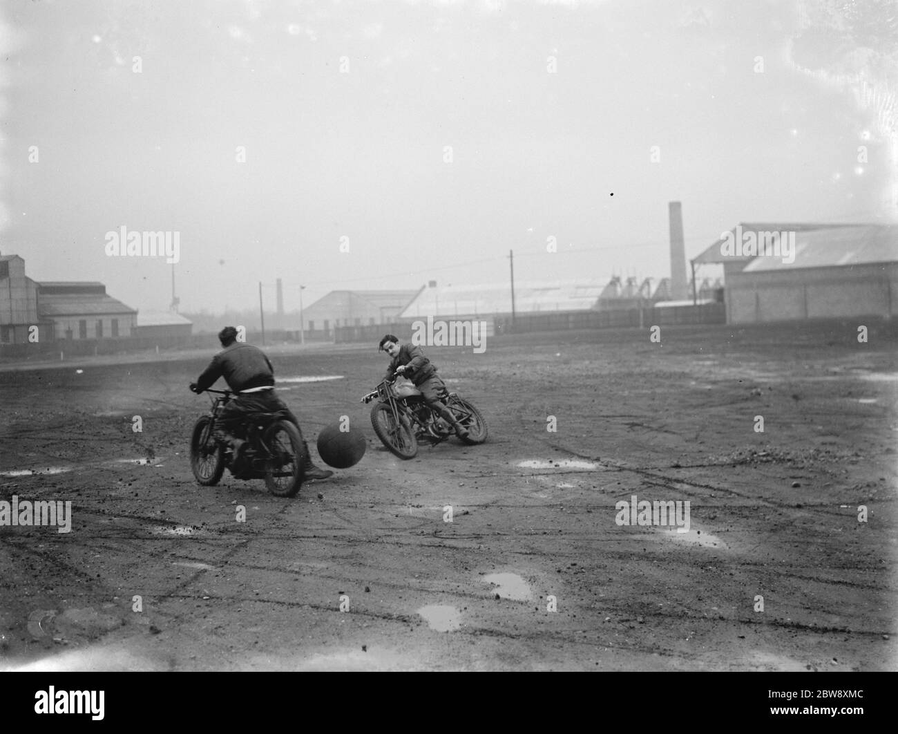 Football on motorcycles at Hackney Wick Stadium in London . Here are the rider during practice . 1937 Stock Photo