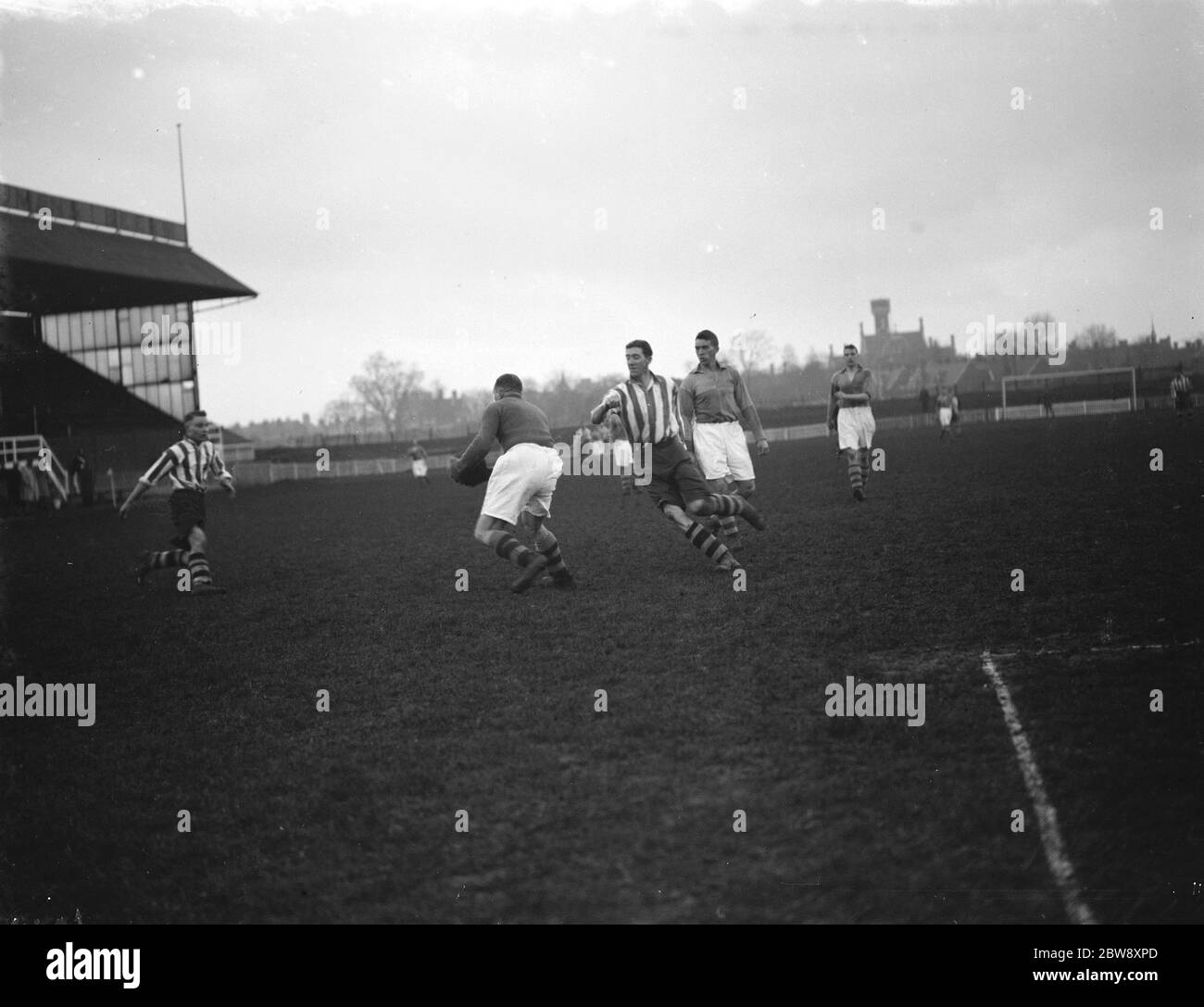 Dartford vs. Tunbridge Wells Rangers - Southern League Mid Week Section - Tunbridge Wells Rangers goalkeeper Jackie Mittell gathers the ball under pressure from Dartford's Ernie Parker - 25/03/39 Action from the game . 4 March 1939 Stock Photo