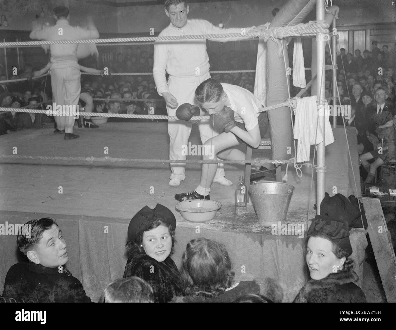 A boys boxing match at Mottingham boys club . In one of the boys corners . 15 April 1939 Stock Photo