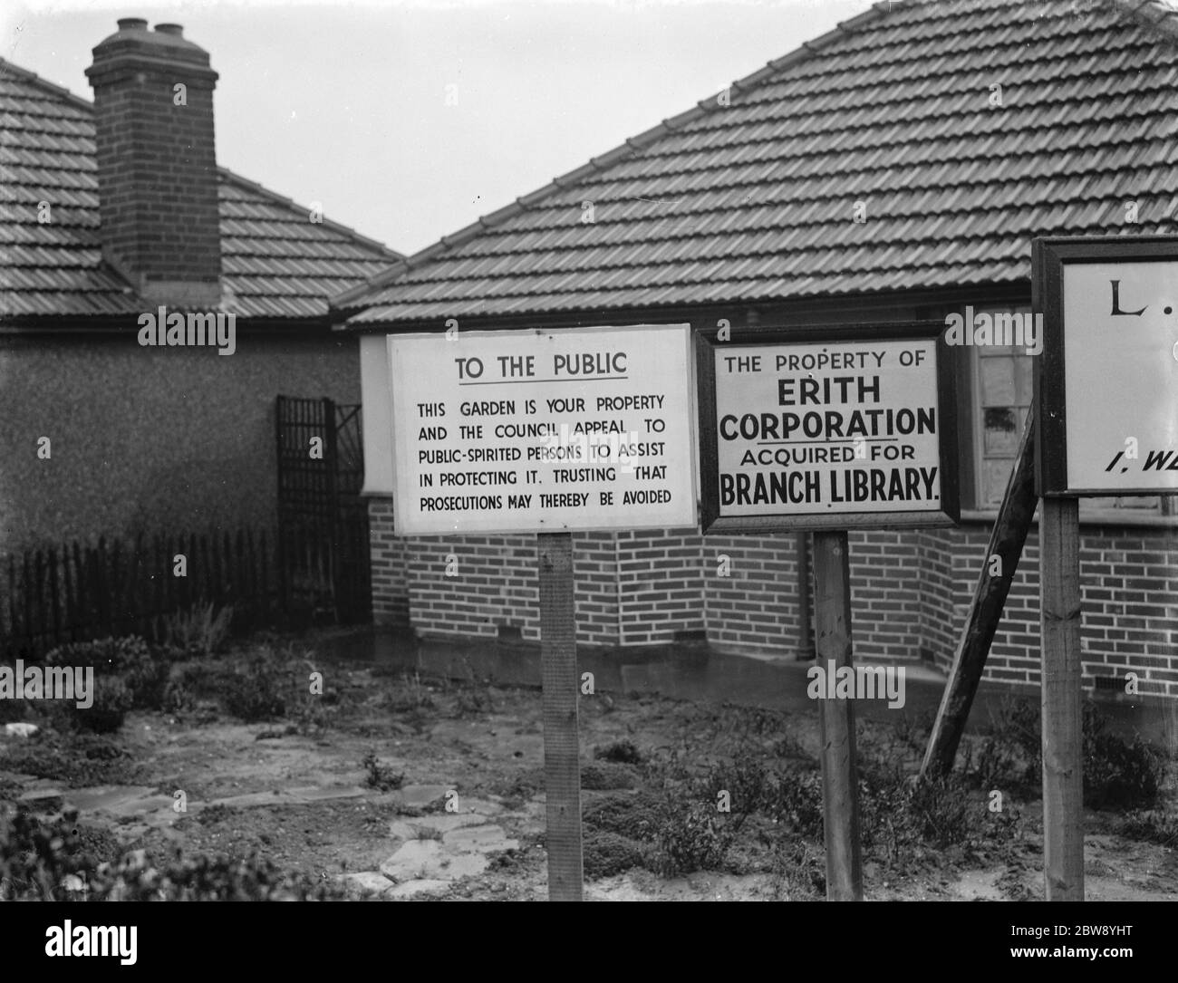 Two contradicting posters on King Harold ' s Way in Barnehurst , London . 1939 Stock Photo