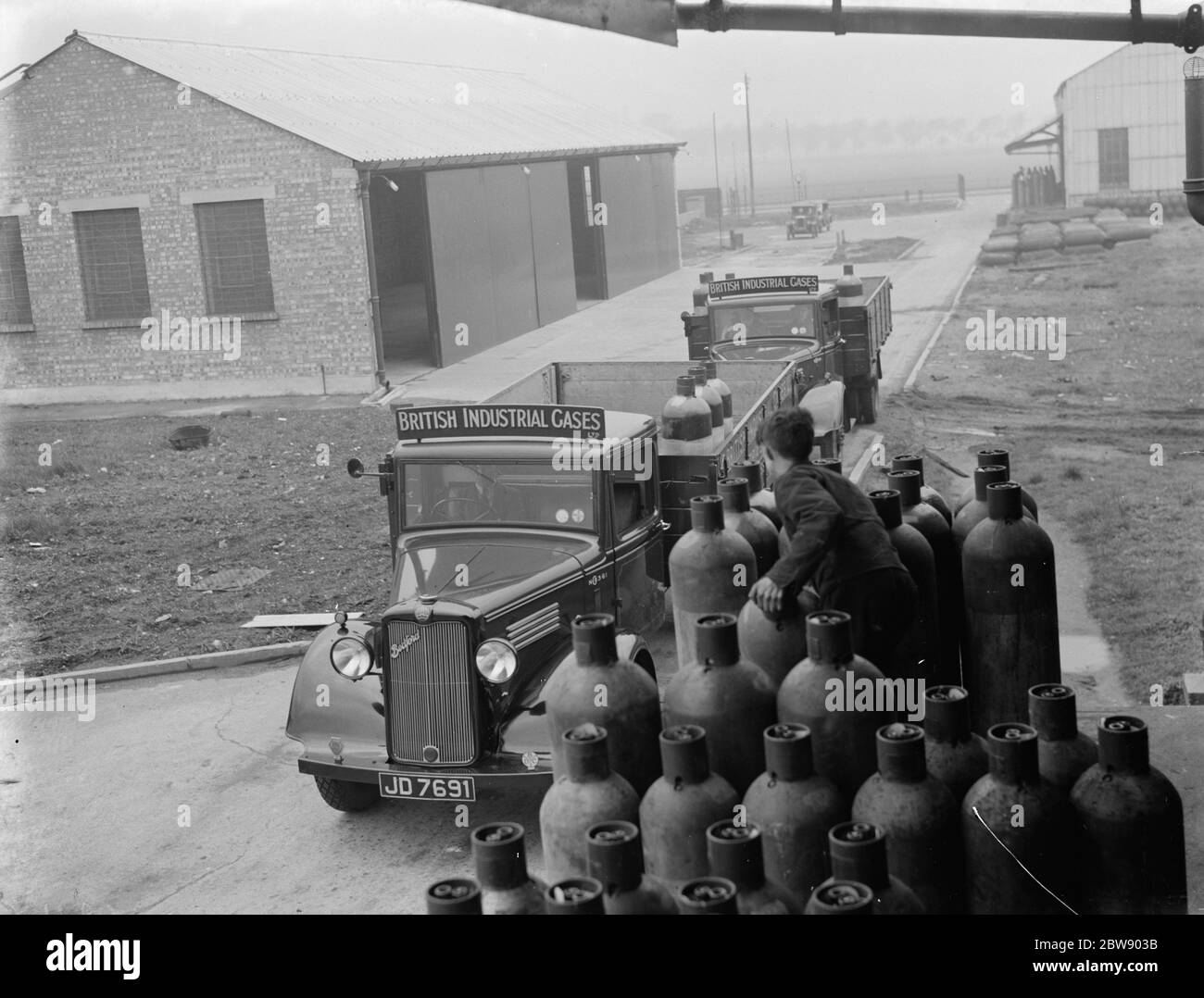 British Industrial Gases Ltd Bedford trucks are being loaded up with