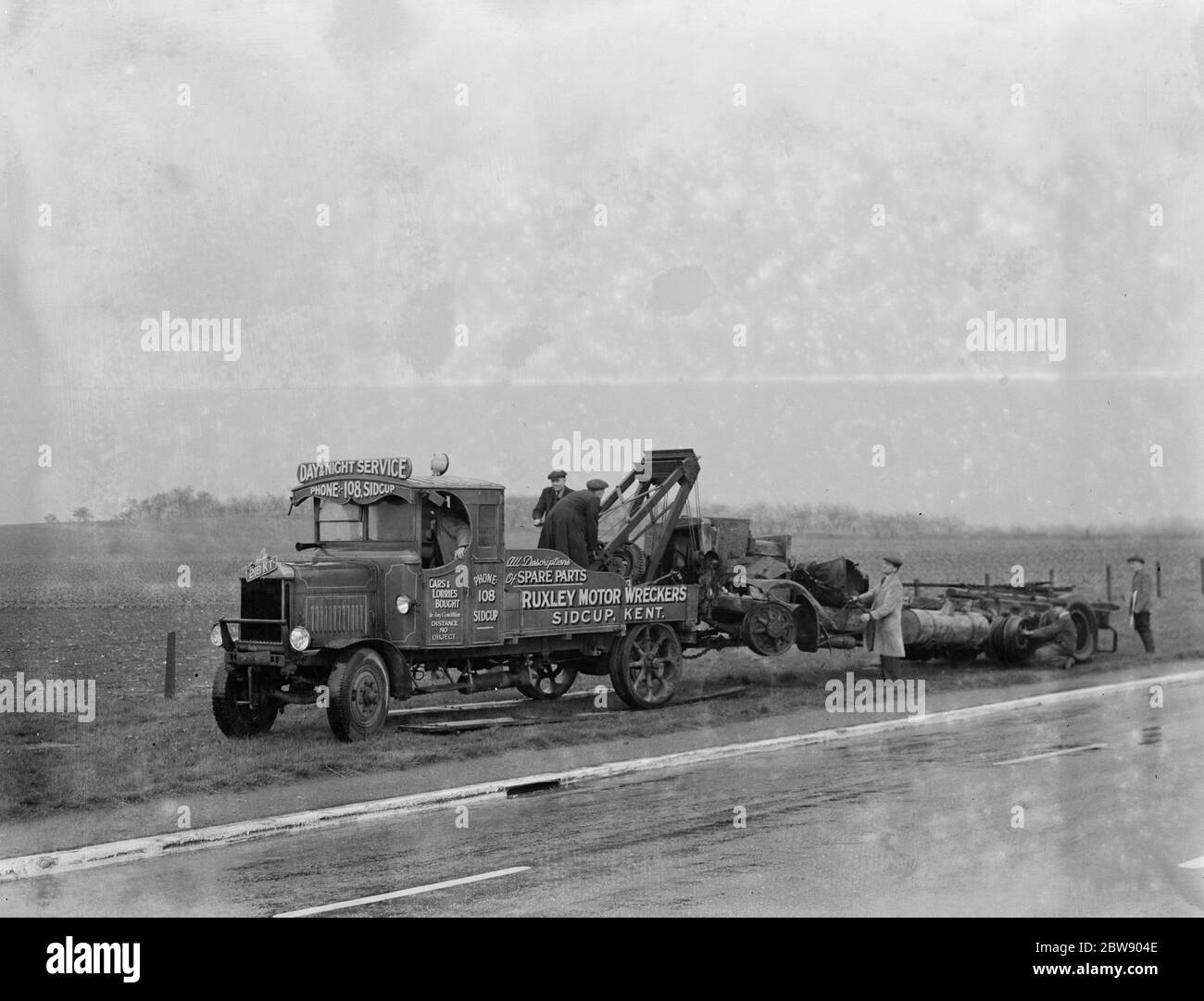 The wreckage of lorry taken by a Ruxley Motors Wreckers winch truck
