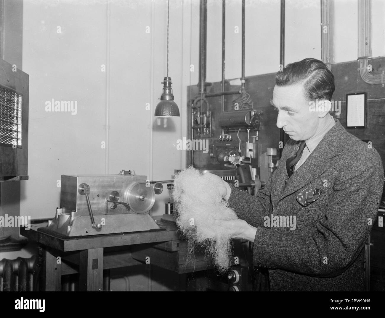 Mr Albert Deering with some recording wax . 1939 Stock Photo