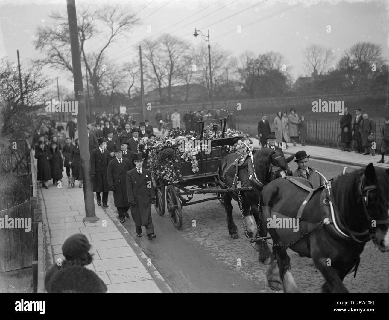 The funeral procession of of farmer MR L Bruce Gibson in East Wickham