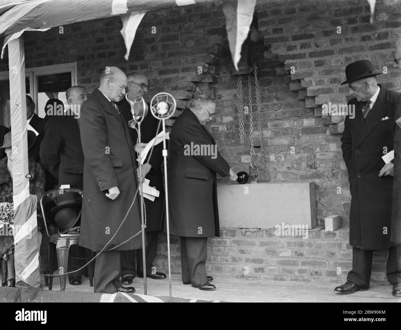 Sir Kingsley Wood laying the foundation stone at the new nurses home , at the Memorial Hospital in Shootershill . 1939 Stock Photo