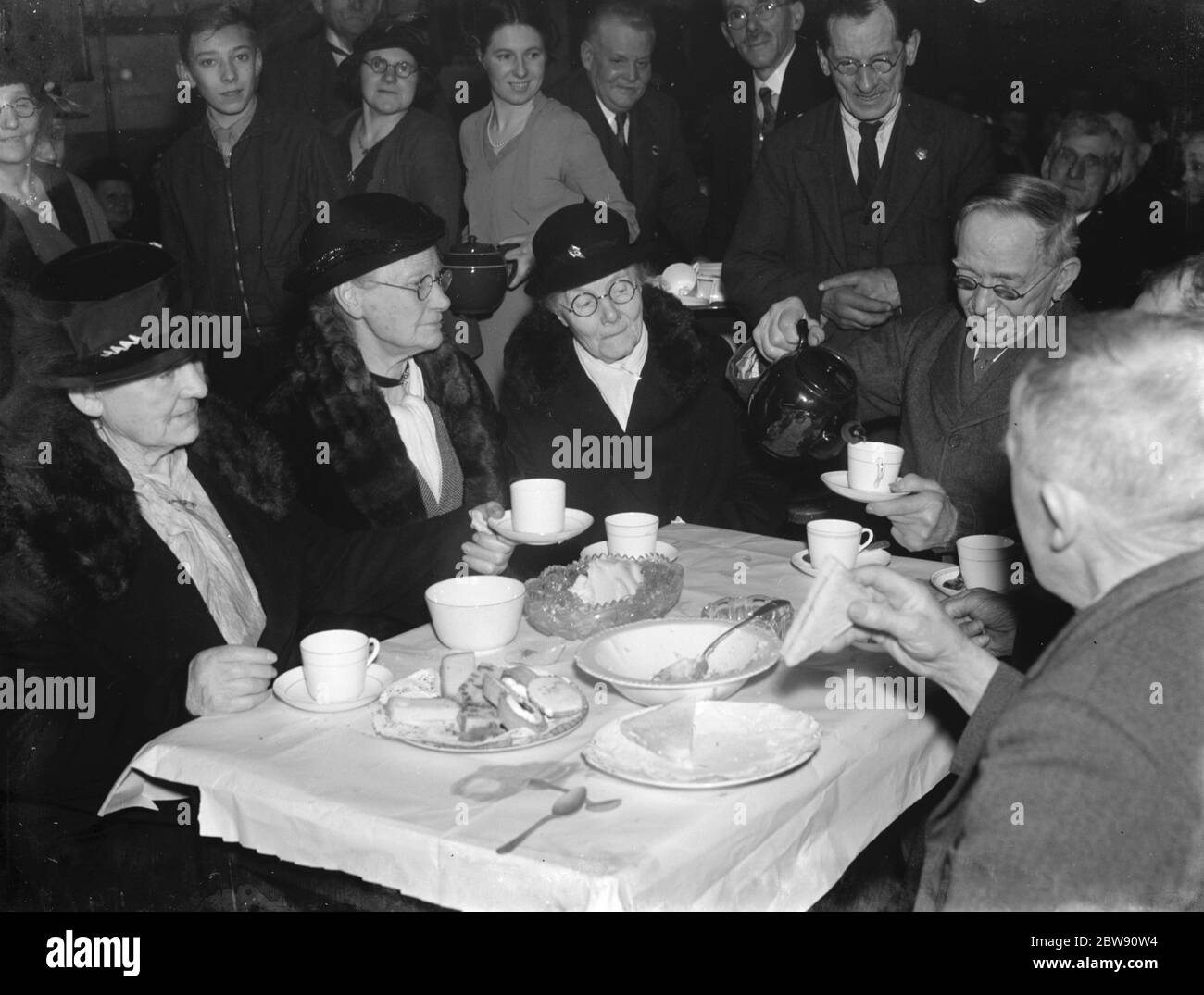 Old folks party in Foots Cray , Kent . 1937 Stock Photo Alamy
