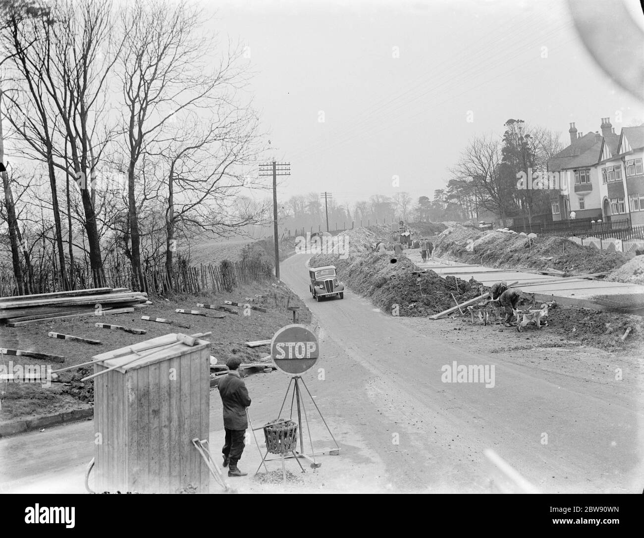 Road widening taking place in Wrotham , Kent . 1937 . Stock Photo