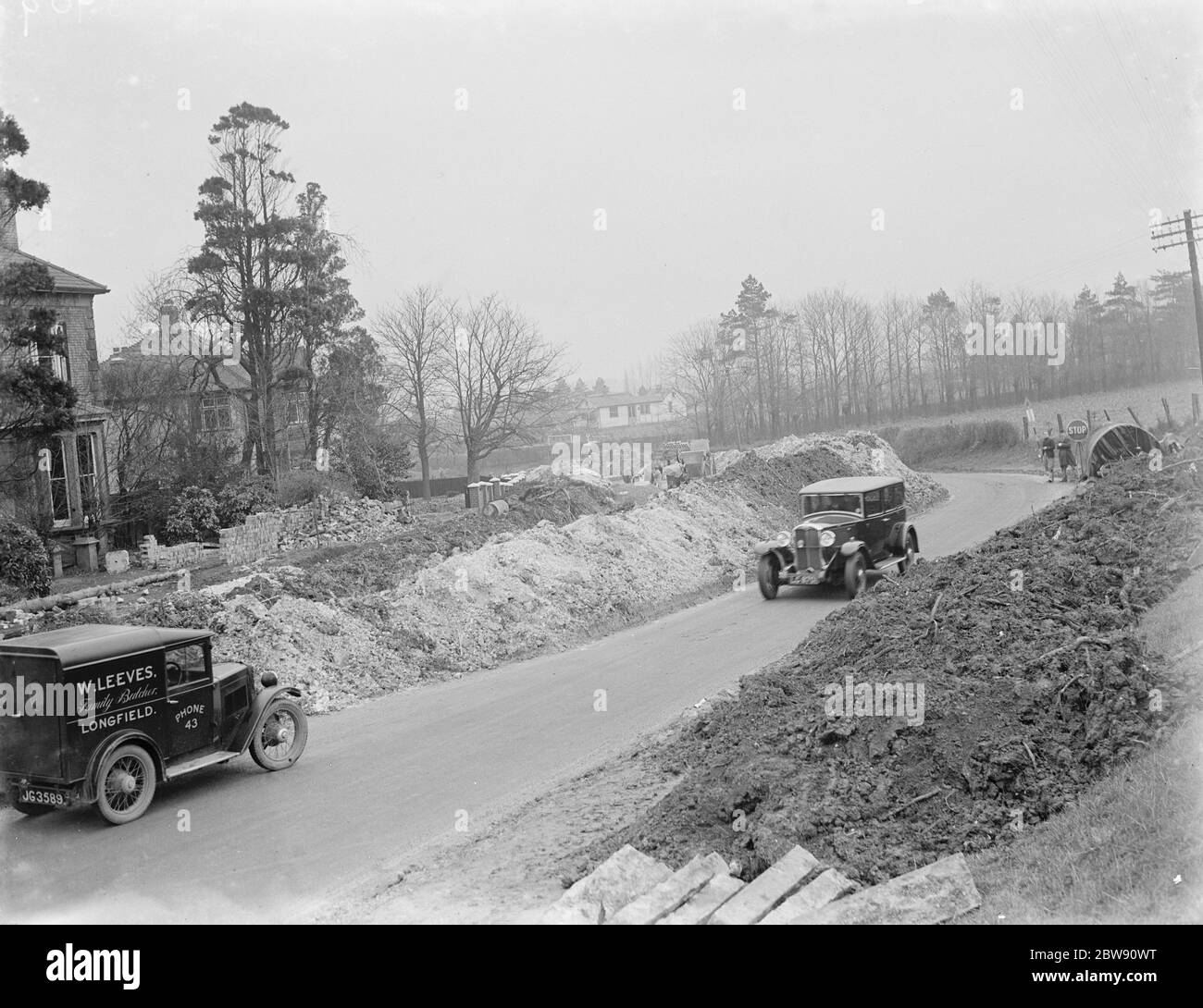 Road widening taking place in Wrotham , Kent . 1937 . Stock Photo