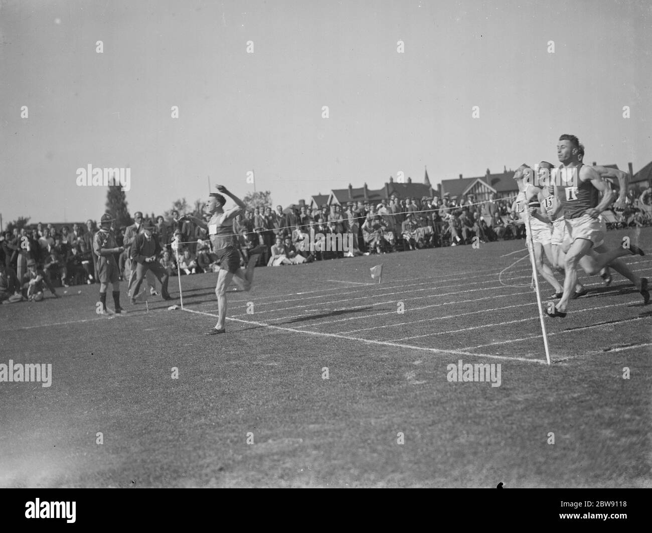 The Woolwich Polytechnic sports event . The finish of the men 's 100 yard dash . 1939 Stock Photo
