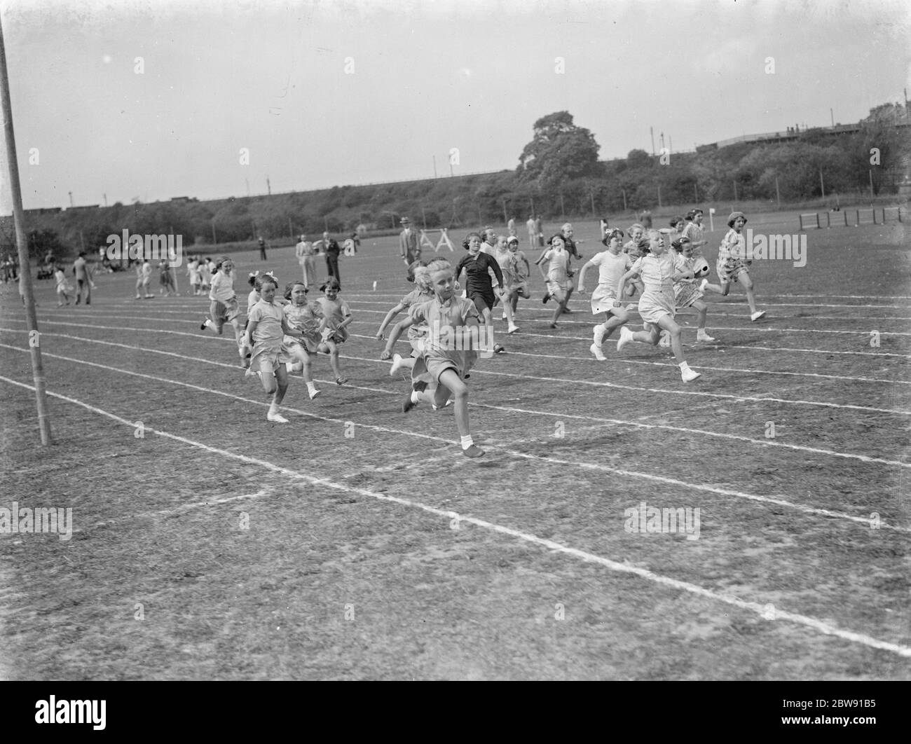 Children in the running race at the PBM sports day . 1939 Stock Photo