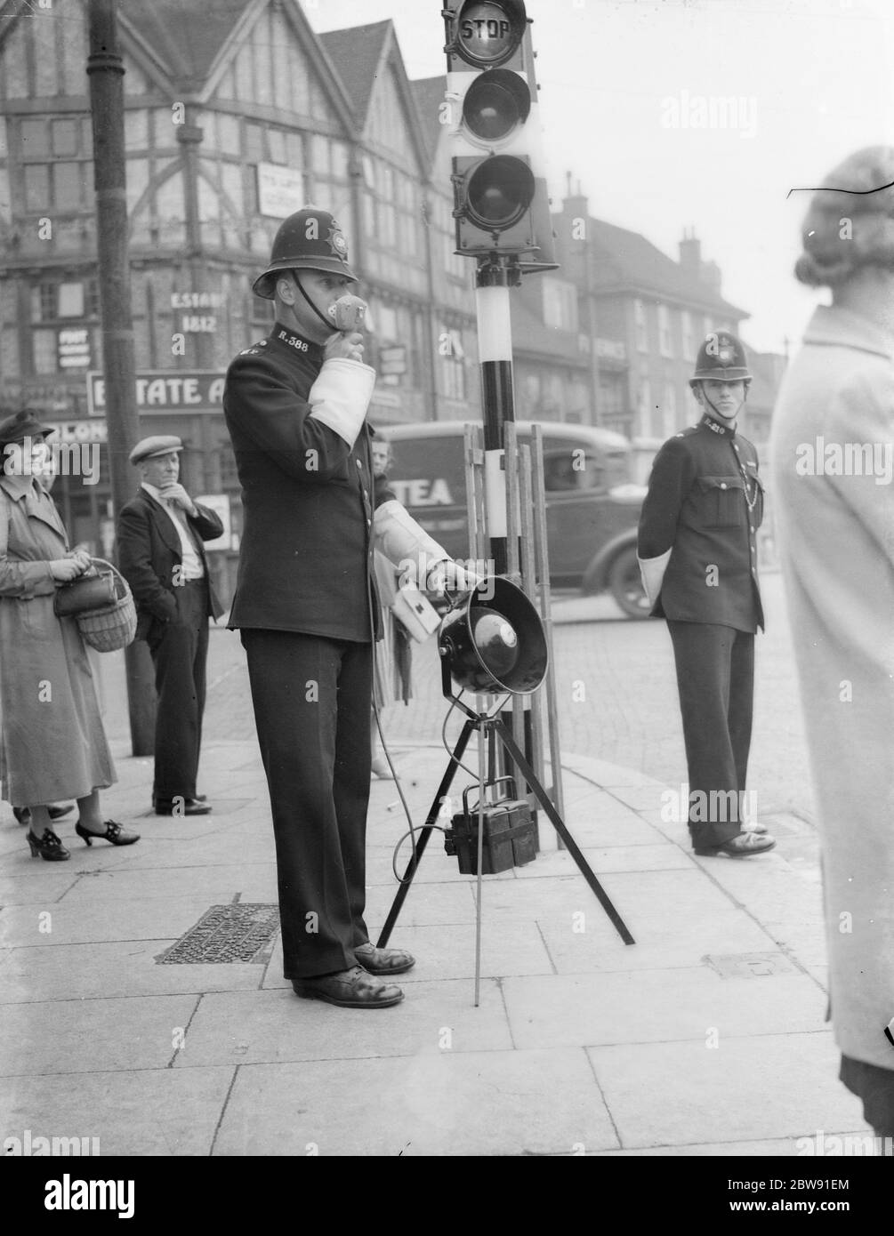 Black bobby police hat hires stock photography and images Alamy