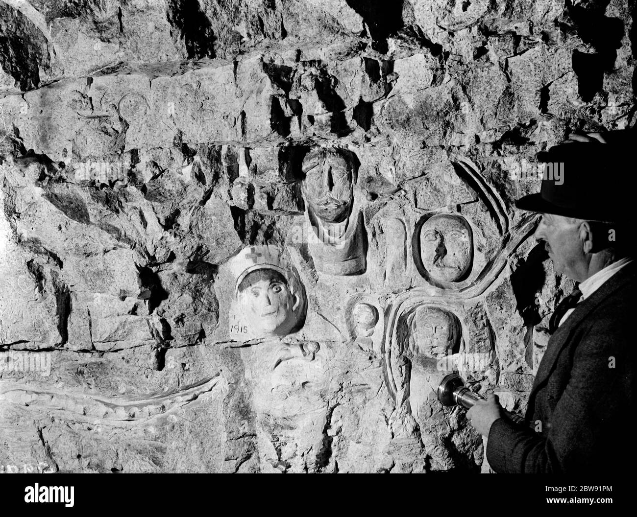 Inside the Chislehurst caves showing the war time ( First World War ) carvings . 1938 Stock