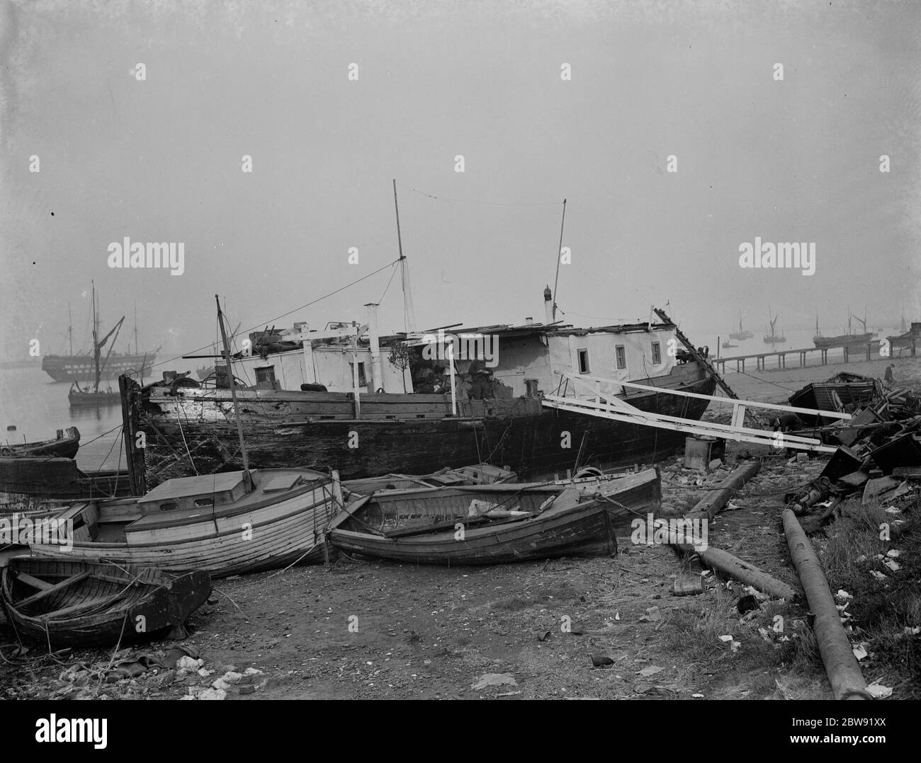 The barge  Mocking Bird  at low tide at Gravesend Reach , Kent . 1938 Stock Photo