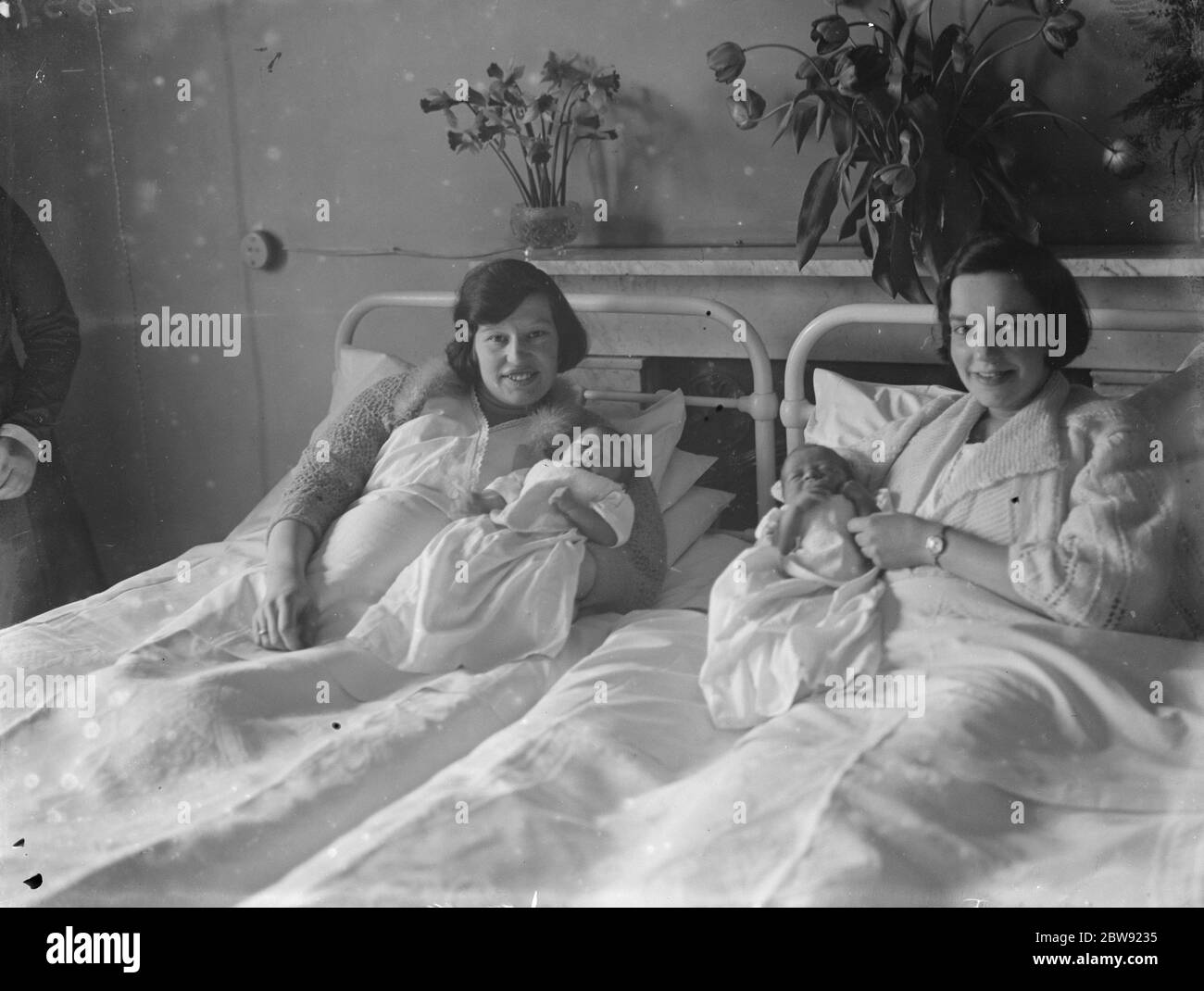 Proud Mums hold their Leap Year babies at Erith Maternity Hospital . 1936 Stock Photo