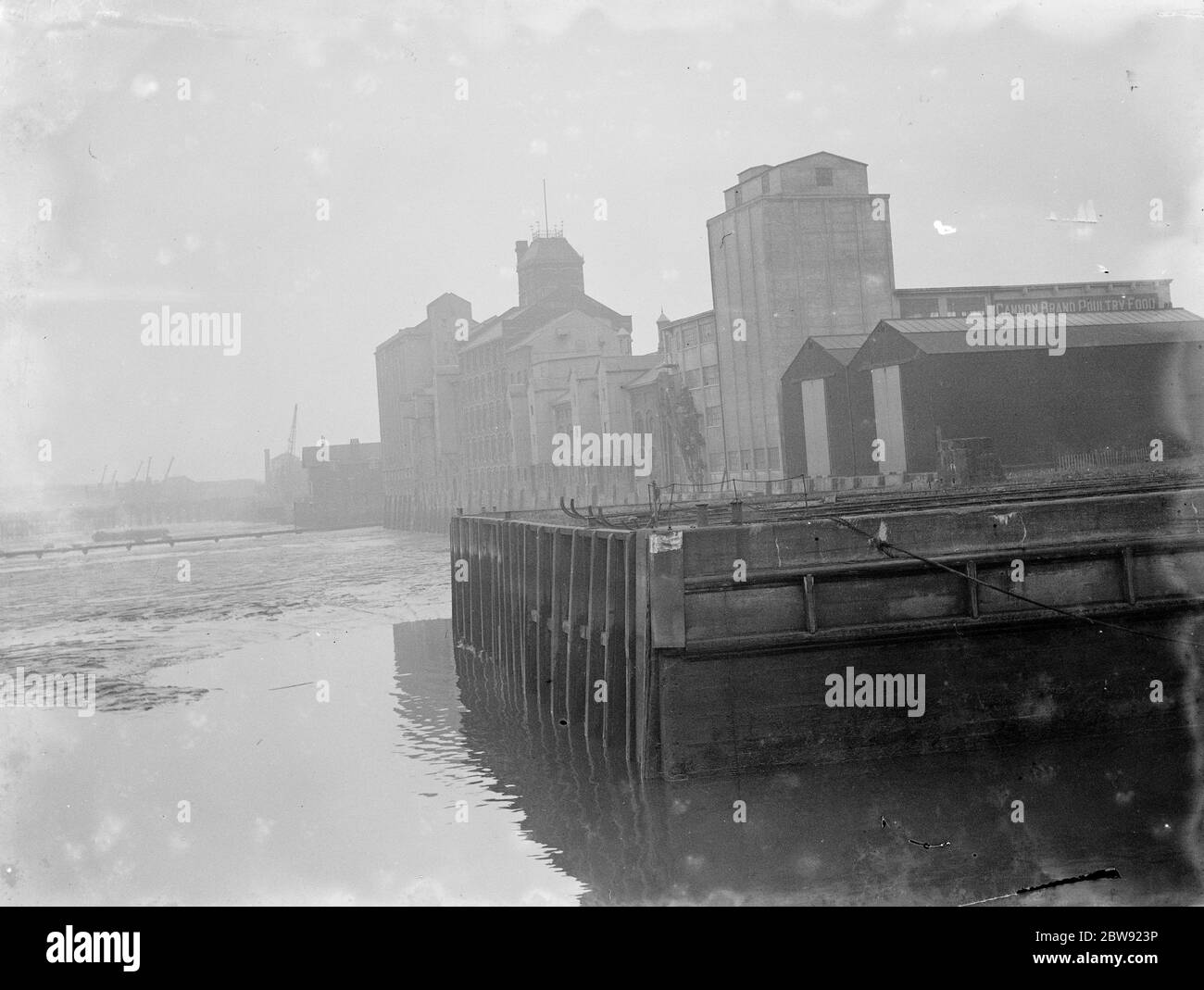 The flour mills on the riverside at Erith in Kent . 1936 Stock Photo
