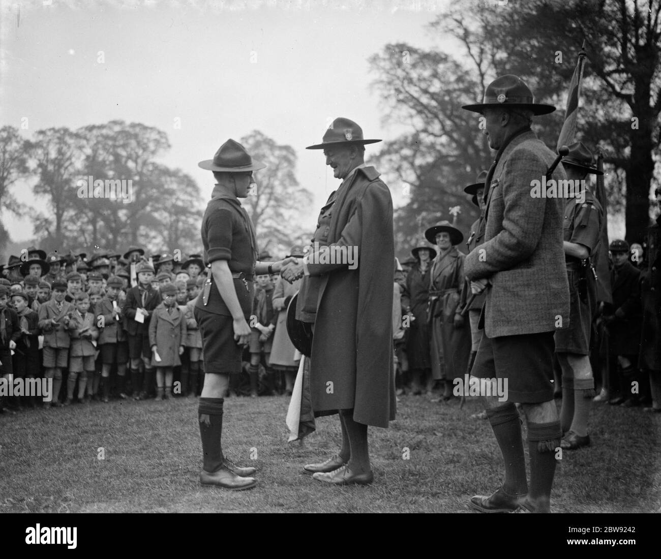 St George ' s day scout parade in Eltham . Sir John Shea presenting a scout with the shield . 1938 Stock Photo