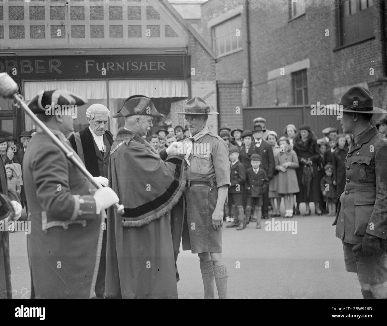 St George ' s day scout parade at Dartford in Kent . The Mayor presents a medal . W A Ward ( Mayor of Dartford ) and Assistant Commander W G Philips . 1938 Stock Photo