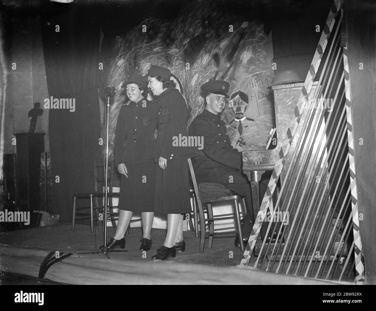 An Auxiliary Fire Service concert party in Dartford . Kent . A solo at the piano . 1939 Stock Photo