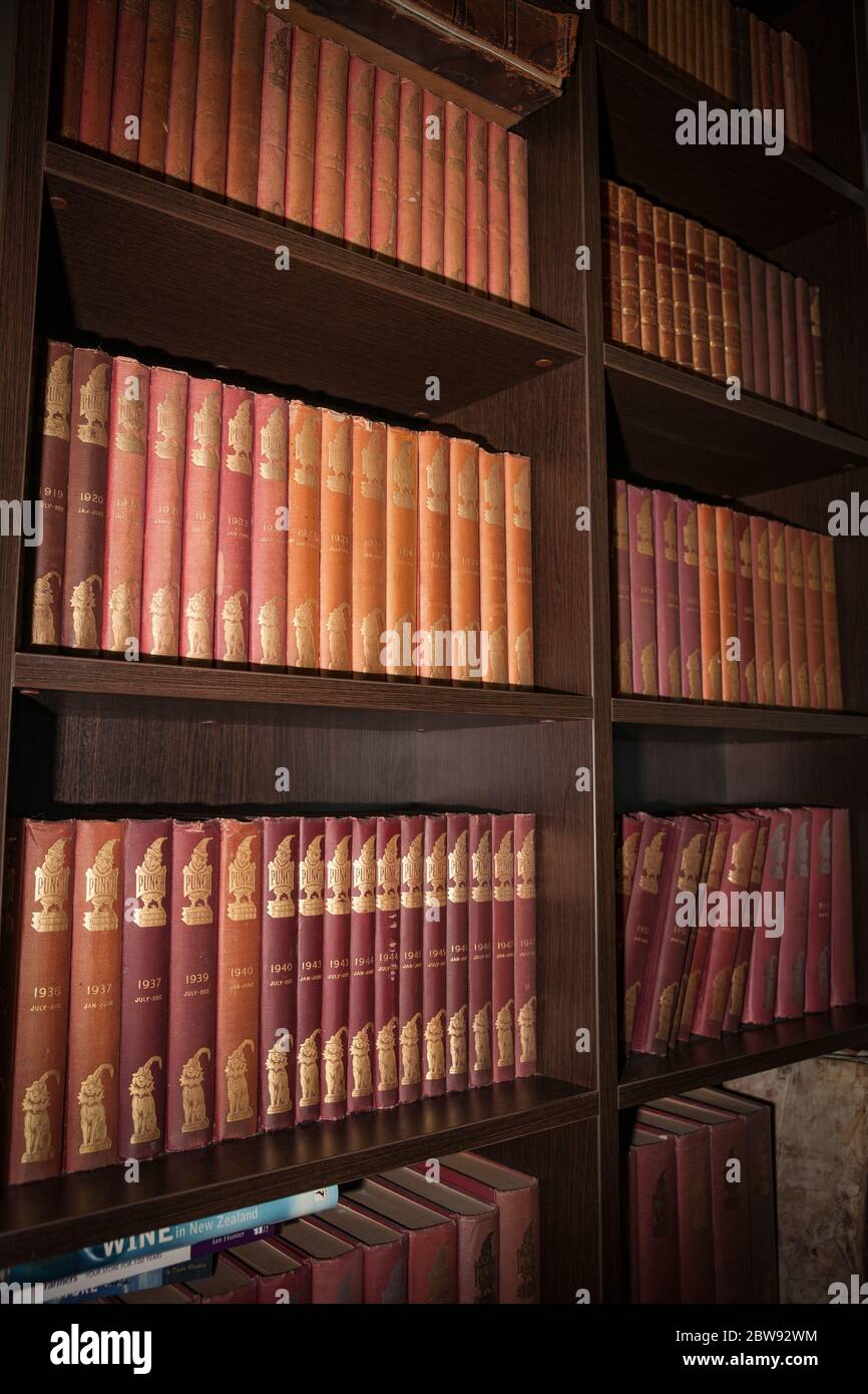 Editorial Bound Books Of Punch Magazine Lined Up On Shelves Of Library In Vertical Composition Stock Photo Alamy