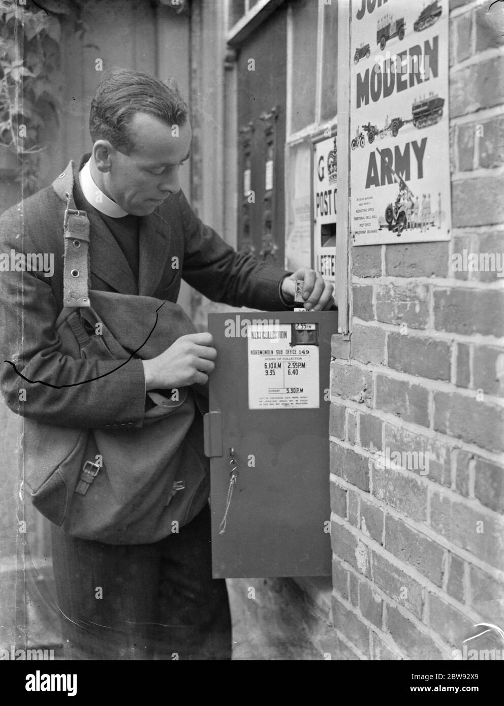 Mr J D Richards , who is acting as an emergency postman in Horsmonden , Kent , is making a collection . 15 September 1939 Stock Photo
