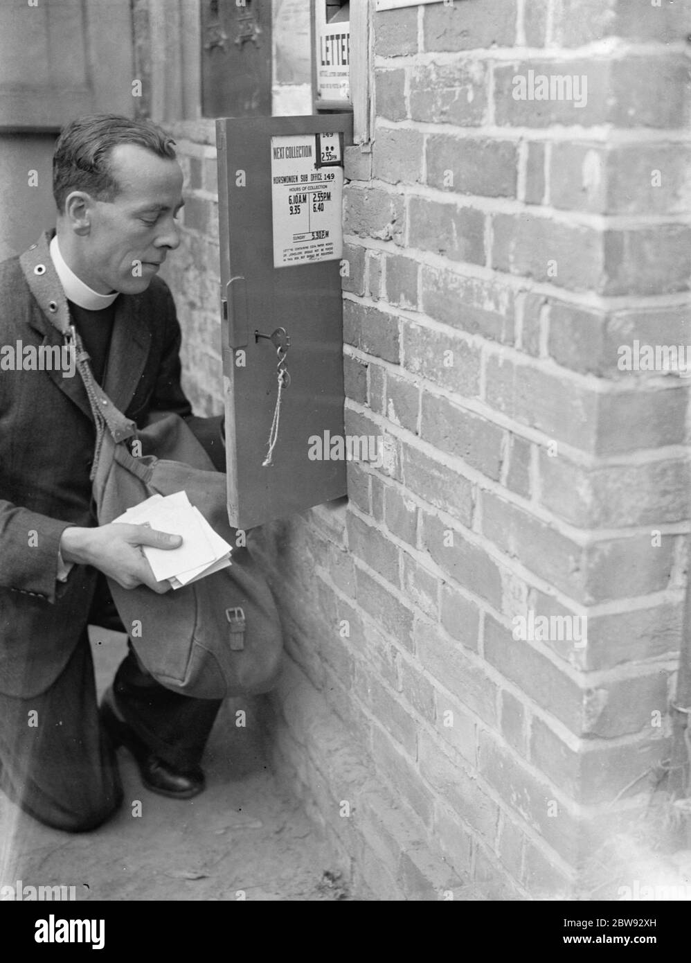 Mr J D Richards , who is acting as an emergency postman in Horsmonden , Kent , is making a collection . 15 September 1939 Stock Photo