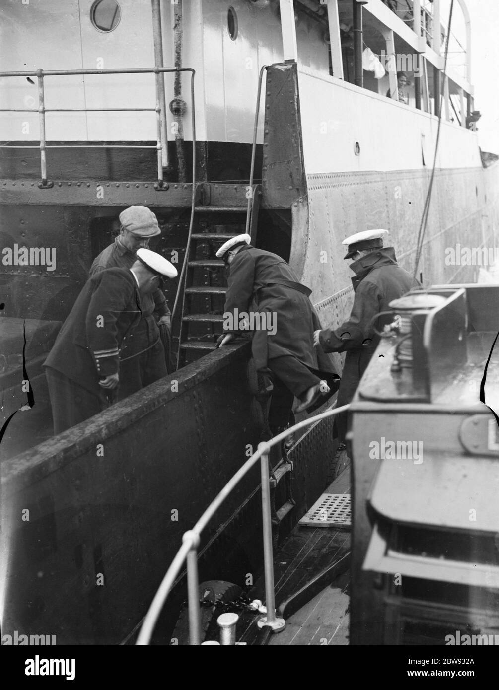 Thames pilots at Gravesend , Kent , who help ships navigate through the congested waters of the harbor. Pilots boarding vessel . 1939 Stock Photo