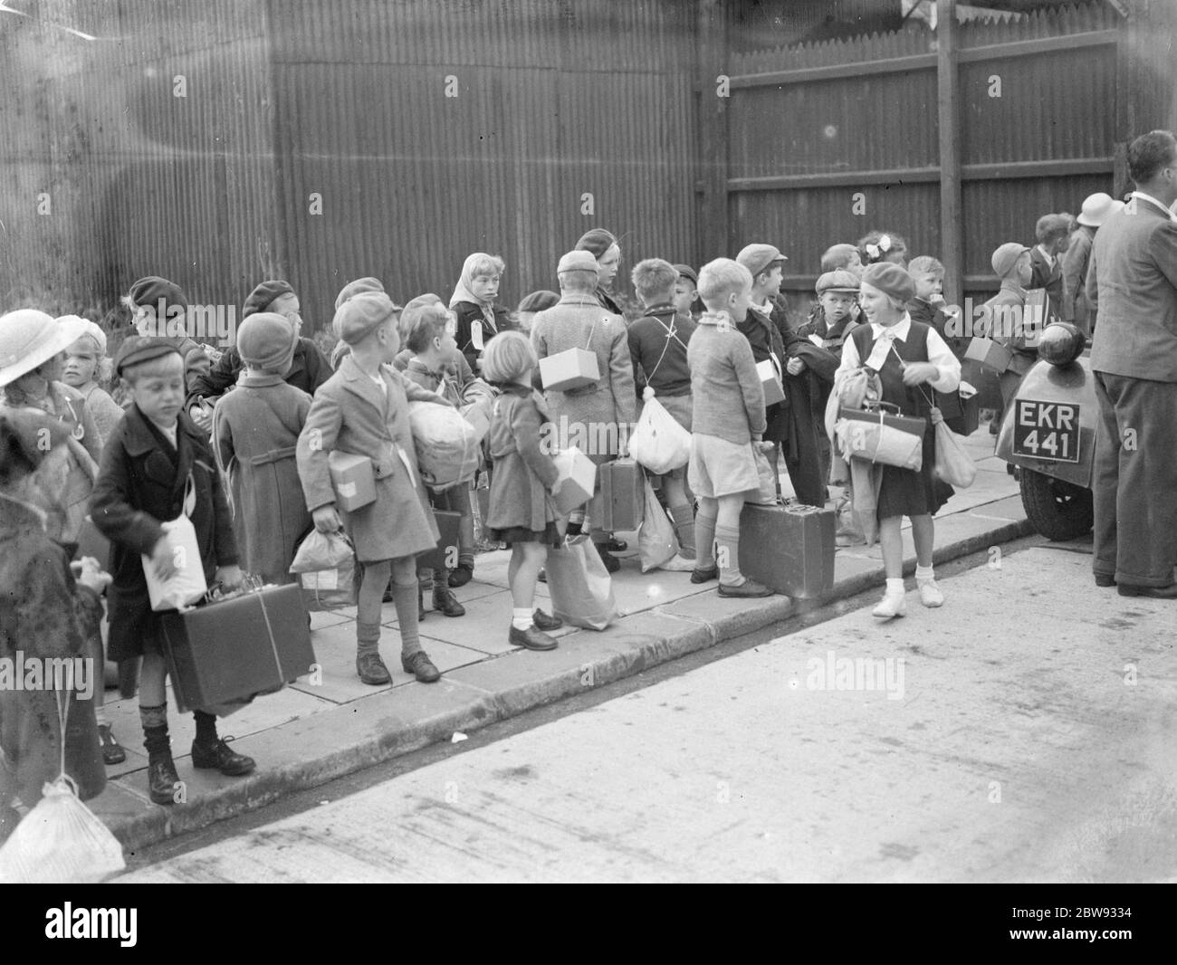 In response to the dangers of war the British government launched a scheme to evacuate the children from major urban centers to private housing in more rural areas . Photo shows children during evacuation procedures in Gravesend , Kent . 1939 Stock Photo
