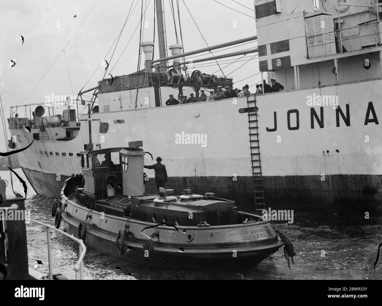 A Port of London Authority doctor 's ship attending to an incident on another ship . 1939 Stock Photo