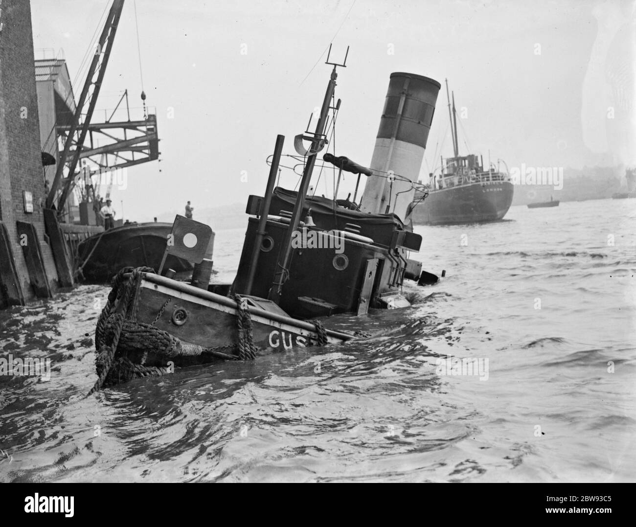 The prow of ' Gusty ' a tug sunk after a collision on the River Thames at Greenwich , London . 1939 Stock Photo