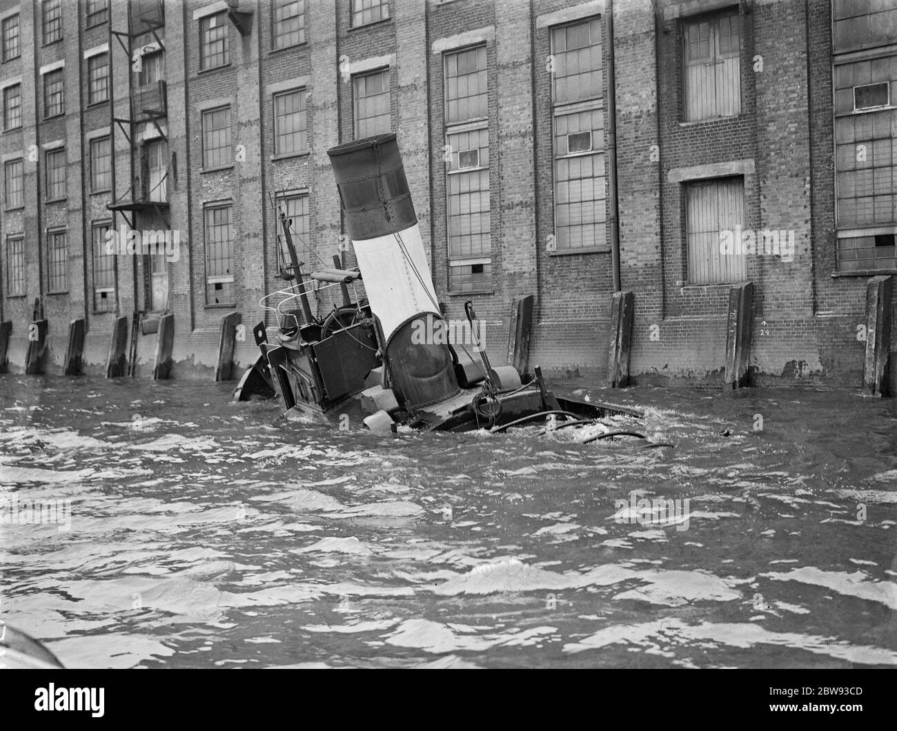 The funnel of ' Gusty ' a tug sunk after a collision on the River Thames at Greenwich , London . 1939 Stock Photo