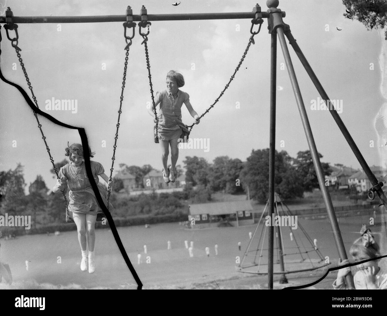 Girls swings Black and White Stock Photos & Images Alamy