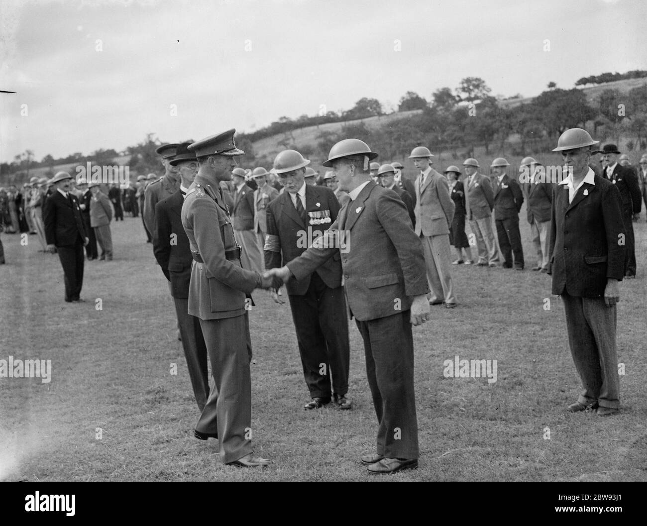 ARP ( Air Raid Precautions ) wardens stand for inspection . 1939 Stock Photo