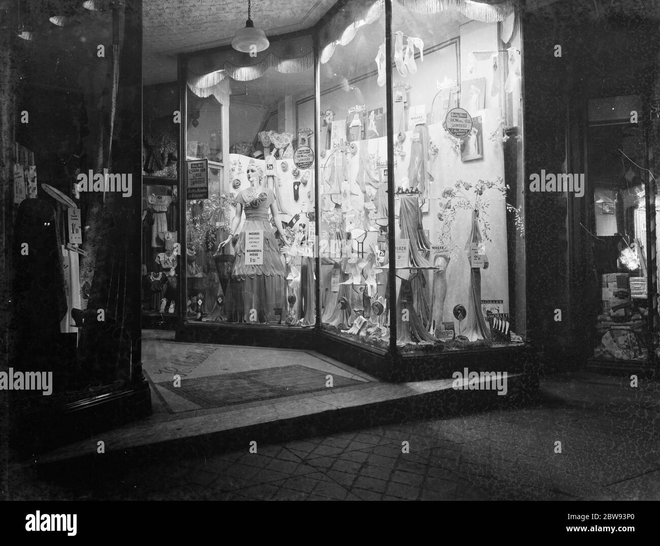 The window display of a Hedley Mitchell store in Erith , London . It is taking part in a window display contest set up by the Daily Mail . 1939 Stock Photo