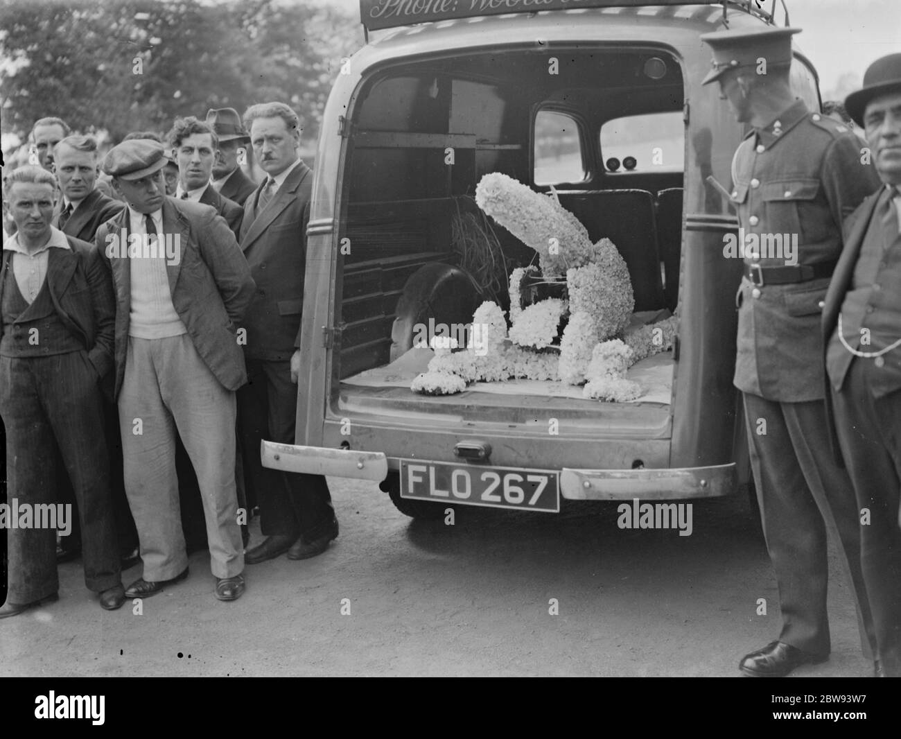 A military funeral procession in Woolwich . Floral spray in the back of a van . 23 May 1939 Stock Photo