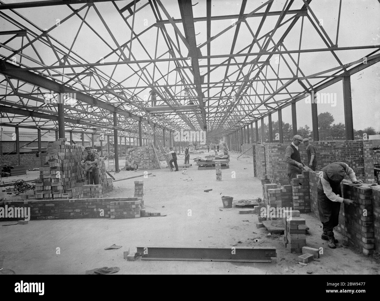 The St Helens Cable & Rubber Company Limited factory being constructed in Slough , Buckinghamshire . The steel work is being carried out by Edward Wood & Company . 1938 Stock Photo