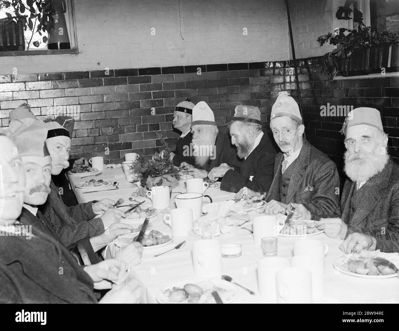 Christmas dinner at the Old Men 's Institue in Farnborough , Kent . 1936 Stock Photo