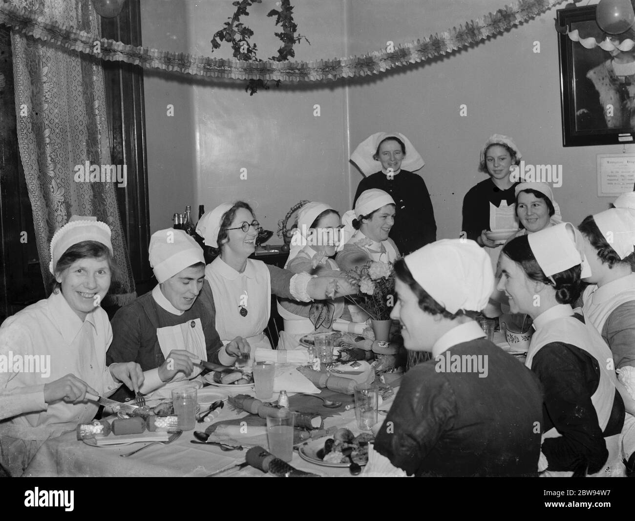 The nurses Christmas dinner at Livingstone Hospital in Dartford , Kent . 1936 Stock Photo