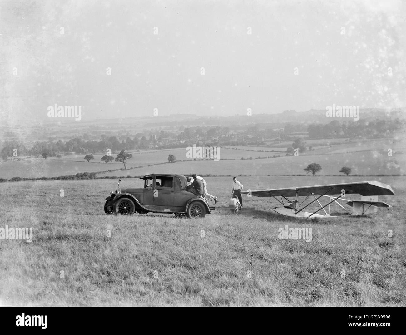 A Cessna CG 2 Glider hitched to the back of a car . 1936 . Stock Photo