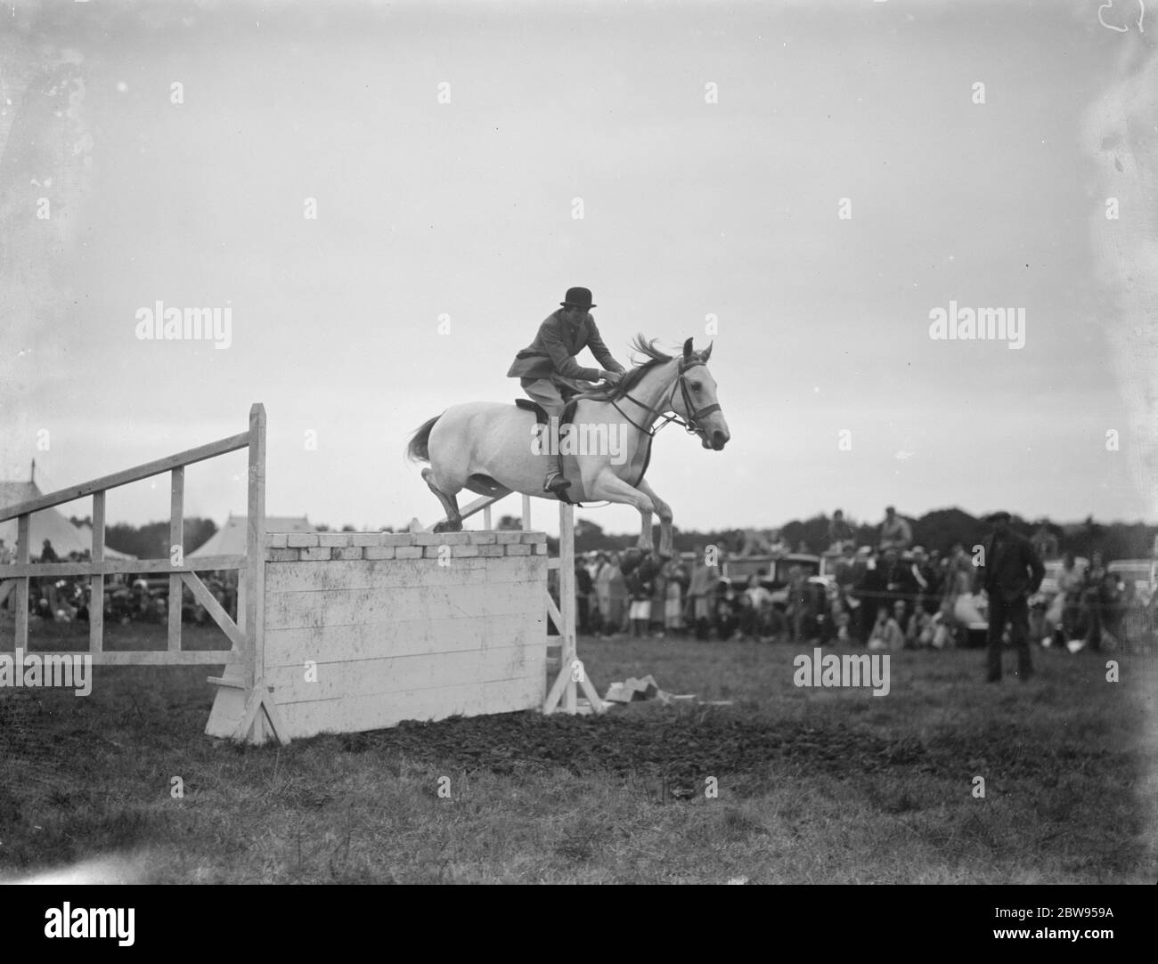 A horse show in Westerham , Kent . The show jumping competition . 1936 Stock Photo