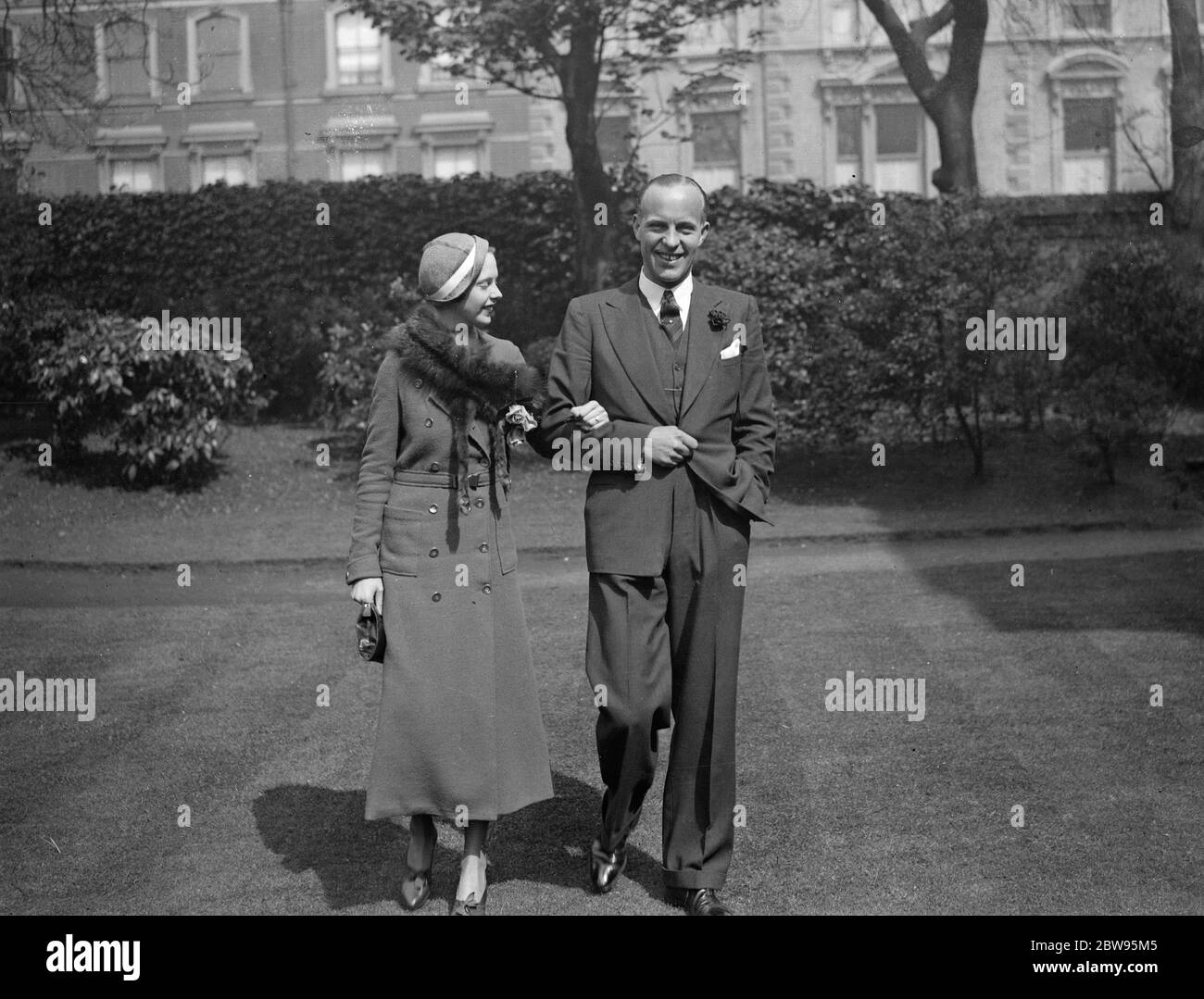 Colonel Leonard Ropner M C , MP engaged . The engagement is announced between Colonel Leonard Ropner M C , MP for the Barkston Asg Division of West Riding , Yorkshire , to Miss Esme Bruce Robertson , daughter of Mr and Mrs Bruce Robertsoin of Kensington . Colonell Leonard Ropner M C , MP , with his fiancee . 10 May 1932 Stock Photo