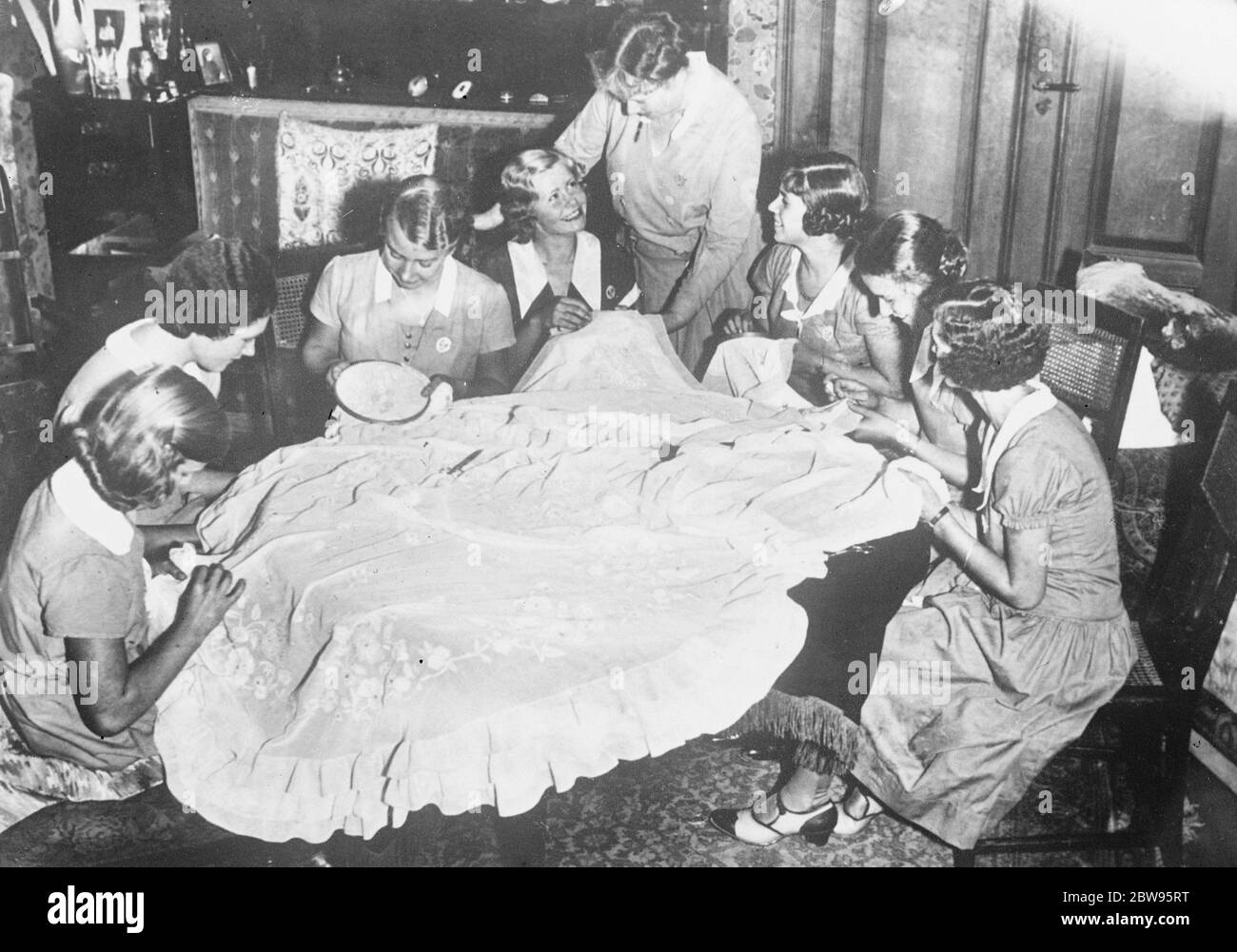Royal bride ' s friends prepare her trousseau . The wedding dress and  trousseau of Princess Sybille of Coburg Gotha who will be married this month  to Prince Gustave Adolf , son