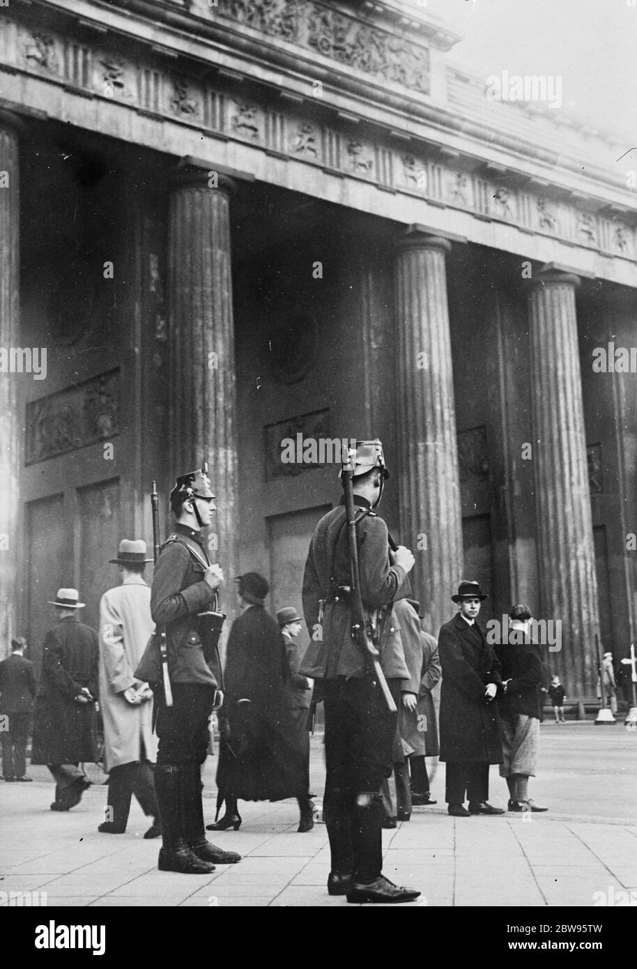 Armed guards on duty patrolling the streets of Berlin during the elections . 25 April 1932 Stock Photo